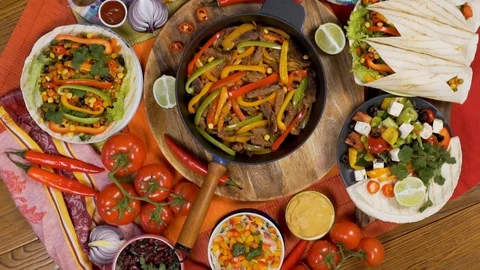 Traditional Mexican Food Delicious Hot Fajitas, Tortillas and Other Dishes Top V Stock Footage