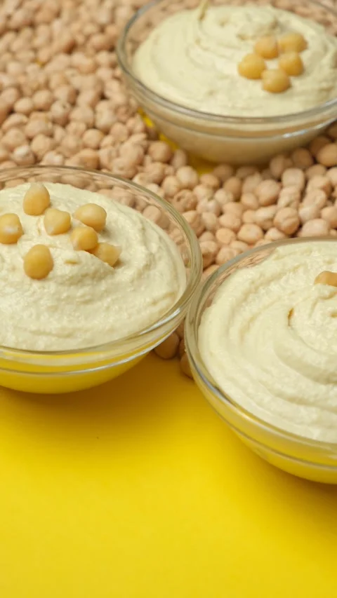 Traditional middle eastern hummus dip in glass bowls. Stock Footage 330962525