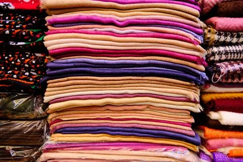 Traditional middle eastern shawls at bazaar Stock Photos