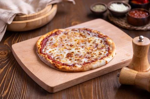 Traditional Middle Eastern spiced flatbread manaqish, topped with cheese Stock Photos