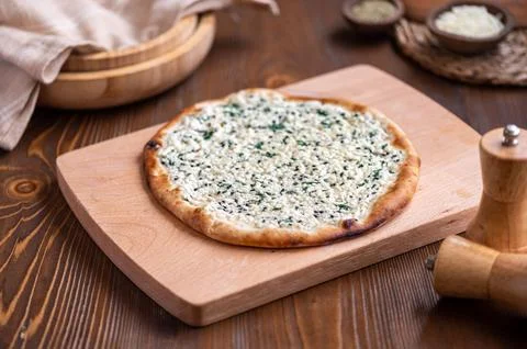 Traditional Middle Eastern spiced flatbread manaqish, topped with cheese Stock Photos