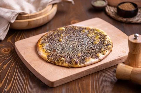 Traditional Middle Eastern spiced flatbread manaqish, topped with zaatar Stock Photos