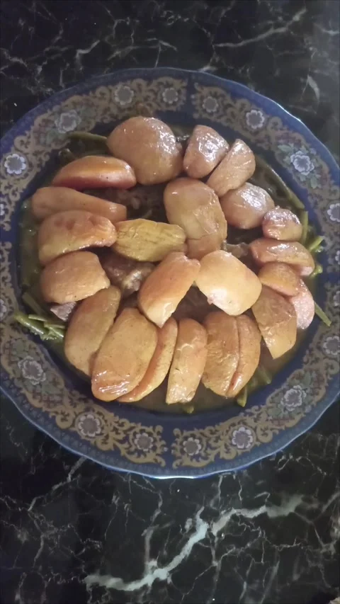 Traditional Moroccan meat and vegetable tajine Stock Footage 345933361