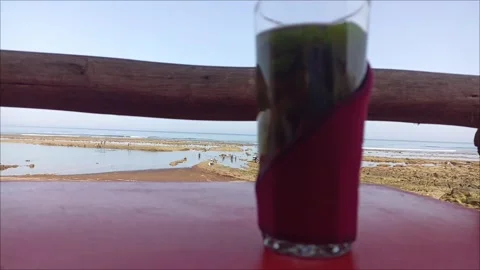 Traditional Moroccan Mint Tea with Beach View in Asilah Vidéo 342141212