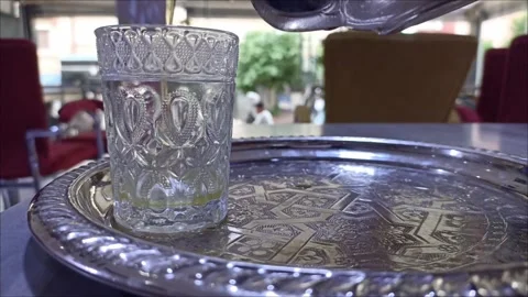 Traditional Moroccan Mint Tea Pouring Ceremony Close-up Stock Footage 334136199