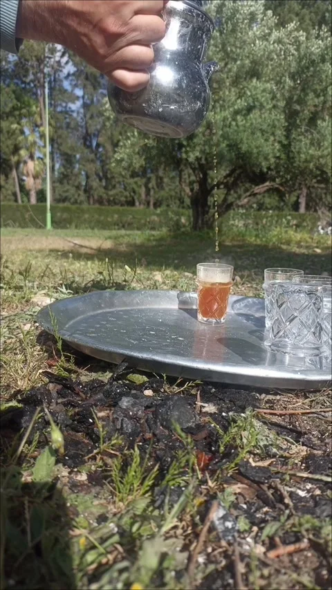 Traditional Moroccan Mint Tea Pouring Outdoors Stock Footage 334580651