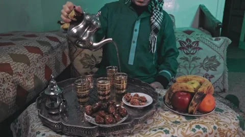 "Traditional Moroccan Tea Serving with Dates and Fruits" Stock Footage 303967800