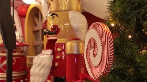 Traditional Nutcrackers Beside Christmas Tree Decorations Stock Footage 323420266