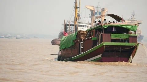 Traditional old looking ship in Yangon port slow motion around, Myanmar Stock Footage 61419481
