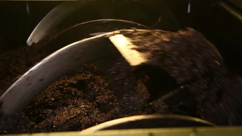 Traditional olive oil processing with crushing the olives into a paste Stock Footage 140217223