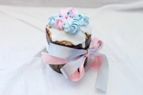 Traditional orthodox easter cake kulich with festive blue and pink decoration Stock Photos