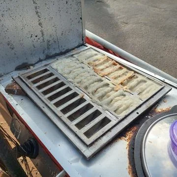 Traditional "pancong" cake from Java, Indonesia Stock Photos