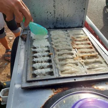 Traditional "pancong" cake from Java, Indonesia Stock Photos