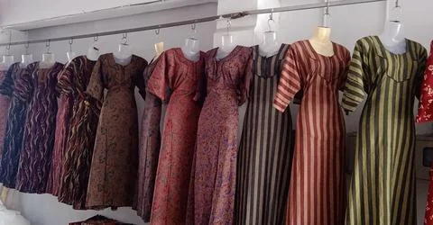 Traditional Patterned Maxi Dresses, Modest Bohemian Market Wear, Vibrant St.. Stock Photos