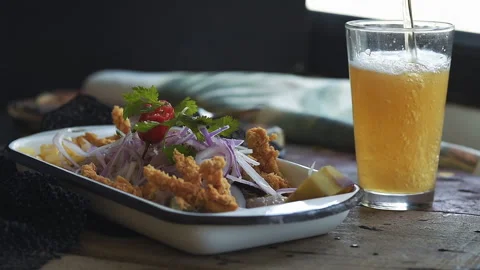 Traditional Peruvian Ceviche with corn and sheet potatoe Stock Footage 341438066