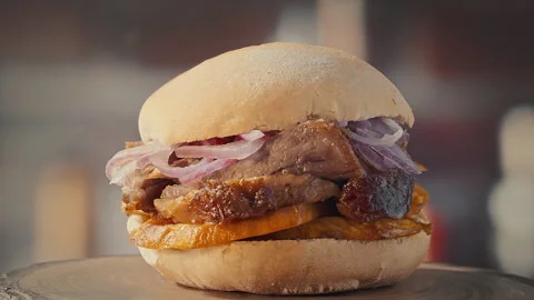 Traditional Peruvian Pan con Chicharron Pork Sandwich with Sweet Potato Vídeo Stock 344983990