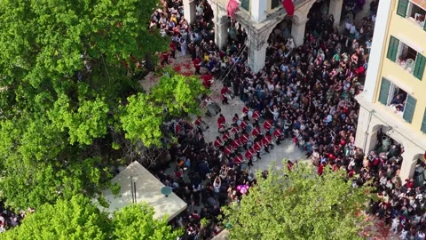 Traditional Philharmonic Marching Band Performs for Crowds During Greek Stock Footage 333783426