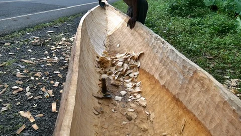 Traditional pirogue making Vídeos de archivo 88133497