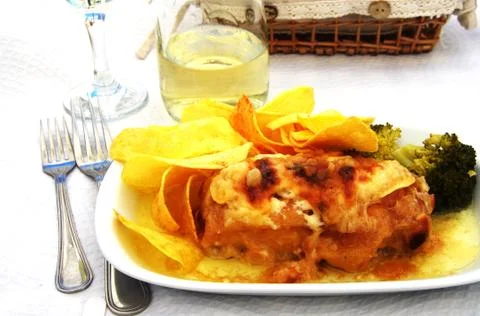 Traditional plate of codfish, bread and wine Foto stock