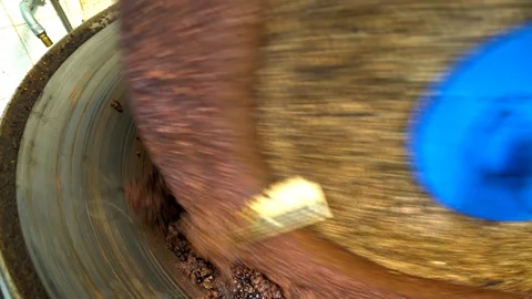 Traditional process of extraction of Extra Virgin Olive oil with granite stones. Stock Footage 95805747