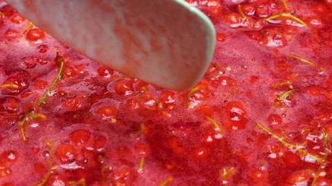 Traditional process of making delicious sweet berry confit or marmalade at home. Video stock 337941220