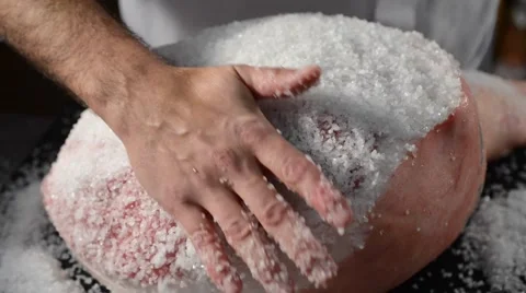 Traditional processing of italian cured ham: salting by hand Stock Footage 63723003