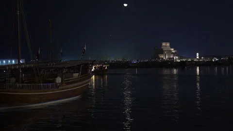 Traditional Qatari Dhow Boat at Dock with Museum of Islamic Art  Stock Footage 333634584