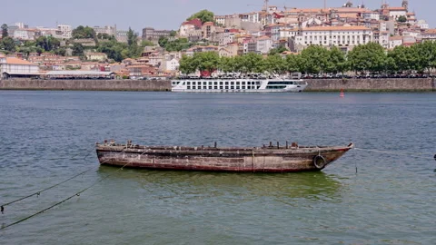 Traditional rabelo boat on the Douro river in Porto, Portugal Stock Footage 342024906