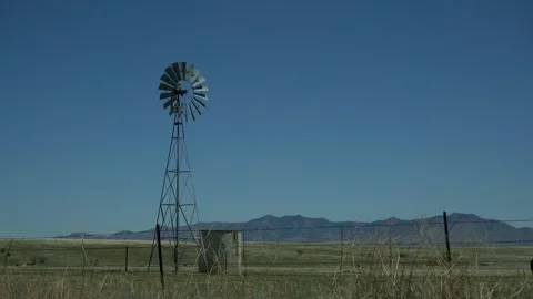 A traditional ranch windmill on the open range Stock Footage 272614967