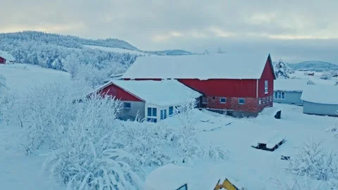 Traditional Red Barn Surrounded By Snow During Winter. Aerial Shot Stock Footage 329531128