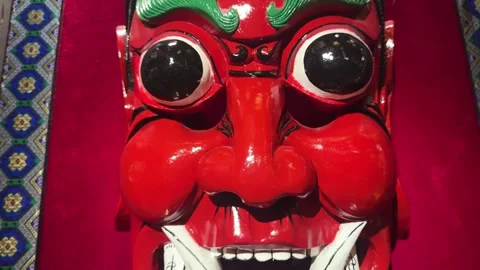 Traditional red demon mask on display 스톡 동영상 341576451