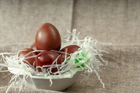 Traditional red Easter eggs in a plate. Viewpoint from above. Easter backgrou Stock Photos