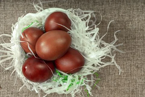 Traditional red Easter eggs in a plate. Viewpoint from above. Easter backgr.. Stock Photos