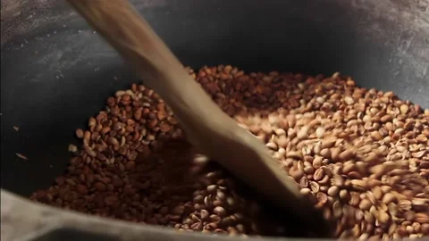 Traditional roasting of coffee beans, using a wooden stove Stock Footage 139946890