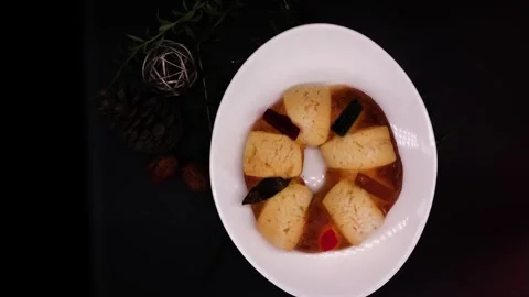 Traditional Rosca de Reyes bread in Mexico on white plate top view Stock Footage 314675069