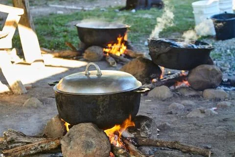 Traditional rustic cooking on an open fire. in the Dominican Republic Stock Photos