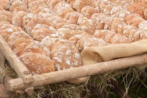 Traditional Rye flour bread cooked on site during the "Speckfest" celebration Stock Photos