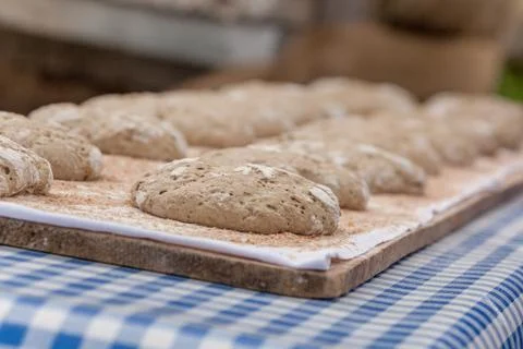 Traditional Rye flour bread cooked on site during the "Speckfest" celebration Stock Photos