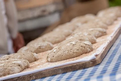 Traditional Rye flour bread cooked on site during the "Speckfest" celebration Stock Photos
