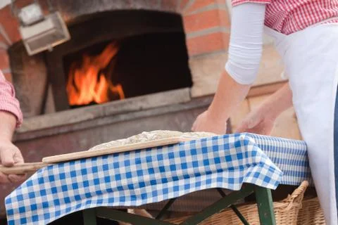 Traditional Rye flour bread cooked on site during the "Speckfest" celebration Foto stock