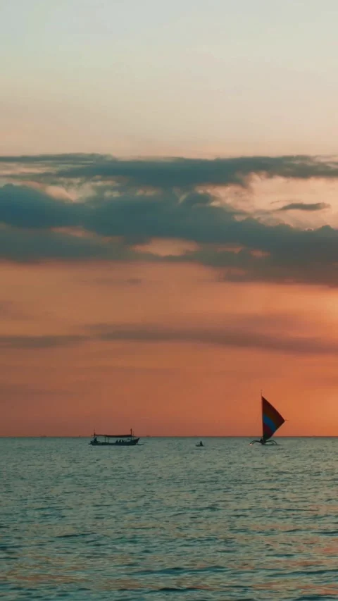 Traditional sailboats float on the ocean Video stock 291848635