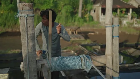 Traditional Salt Making Process on the beach sea shore Bali, Indonesia Stock-Footage 221648570