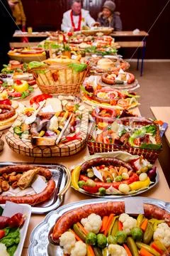 Traditional sausages are arranged for review at food contest Stock Photos