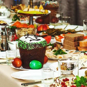 Traditional served Easter table with eggs and Easter in Ukraine. Stock Photos