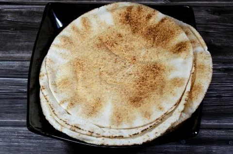 Traditional Shami flat bread with wheat and flour, small Aish Shamy or smal.. Stock Photos
