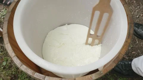 Traditional Sheep Cheese Making – Breaking and Stirring Stock Footage 314552061