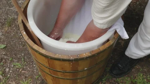 Traditional sheep cheese making – scooping cheese onto white cloth Stock Footage 314552042