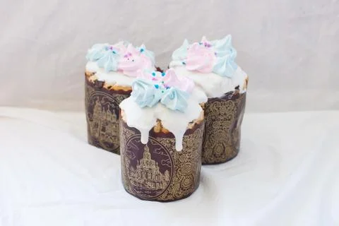 Traditional slavic orthodox easter cake named kulich with white icing, mering Stock Photos