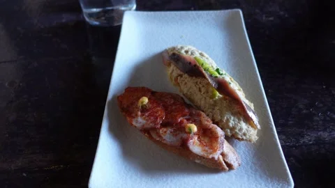 Traditional Spanish Basque bread snack called Pintxo Stock Footage 291987527