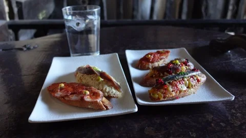 Traditional Spanish Basque bread snack called Pintxo Stock Footage 291987535